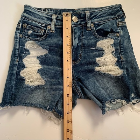 AEO Next Level Stretch Hi-rise Shortie Distressed Fray Denim Shorts - Picture 11 of 13